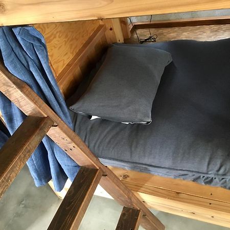 Guest House Golden Mile Hostel Amami Zimmer foto